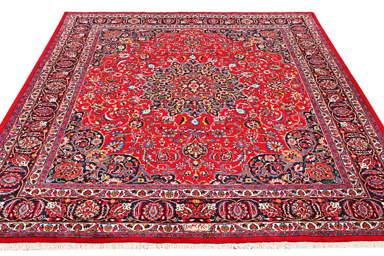 A Najafabad carpet, c. 351 X 305 cm.
