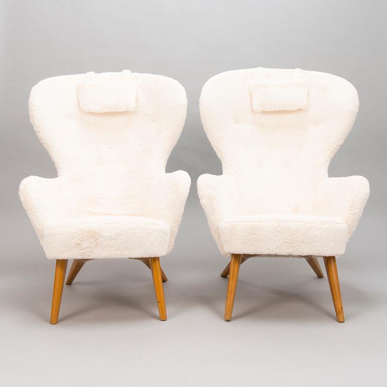 CARL GUSTAF HIORT AF ORNÄS, Two mid-20th century 'Siesta' armchairs for för Puunveisto Oy - Träsnideri Ab.