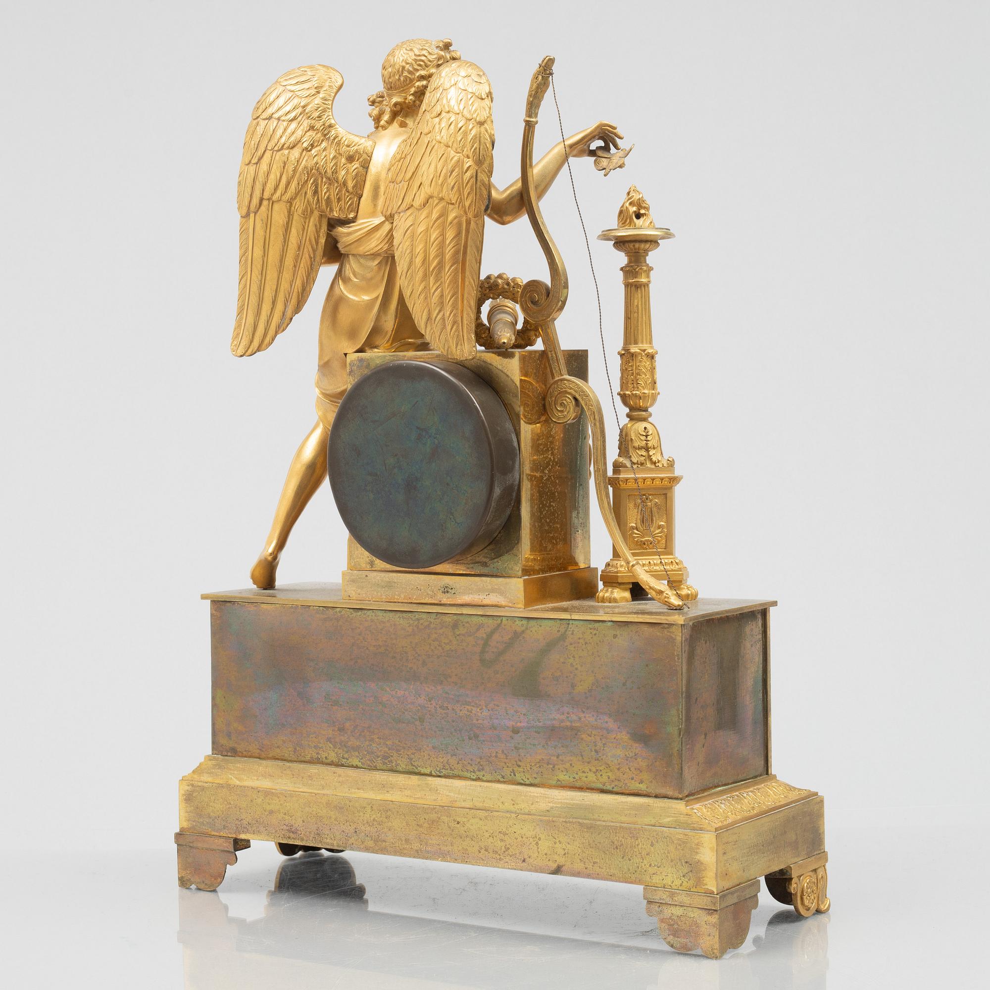 An Empire mantel clock, first half of the 19th century.