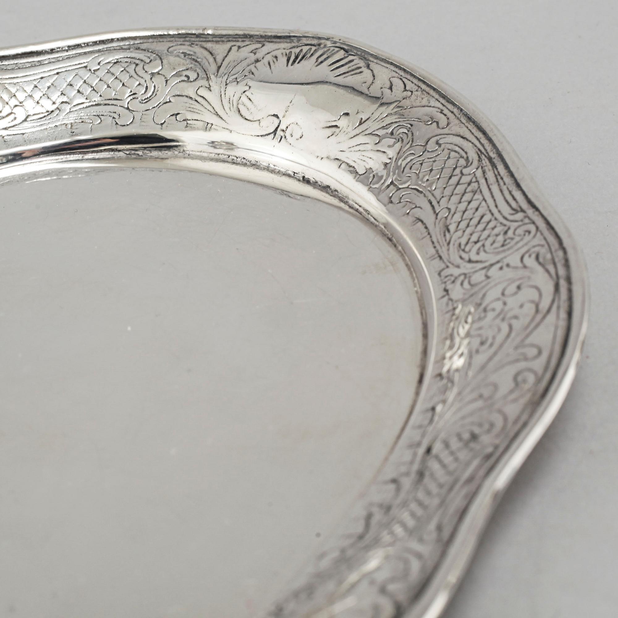 A silver sugarbowl, a cream jug and a tray by J L Hultman, Stockholm, mid 20th century.