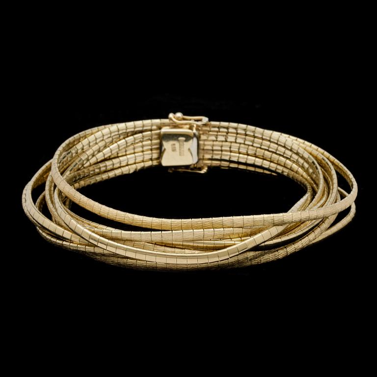 A gold bracelet, weight 63 g.