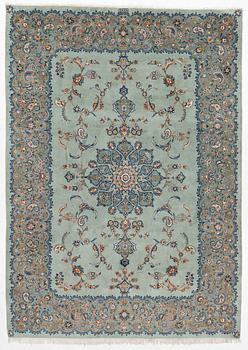 A Keshan carpet, signed, c. 376 x 270 cm.