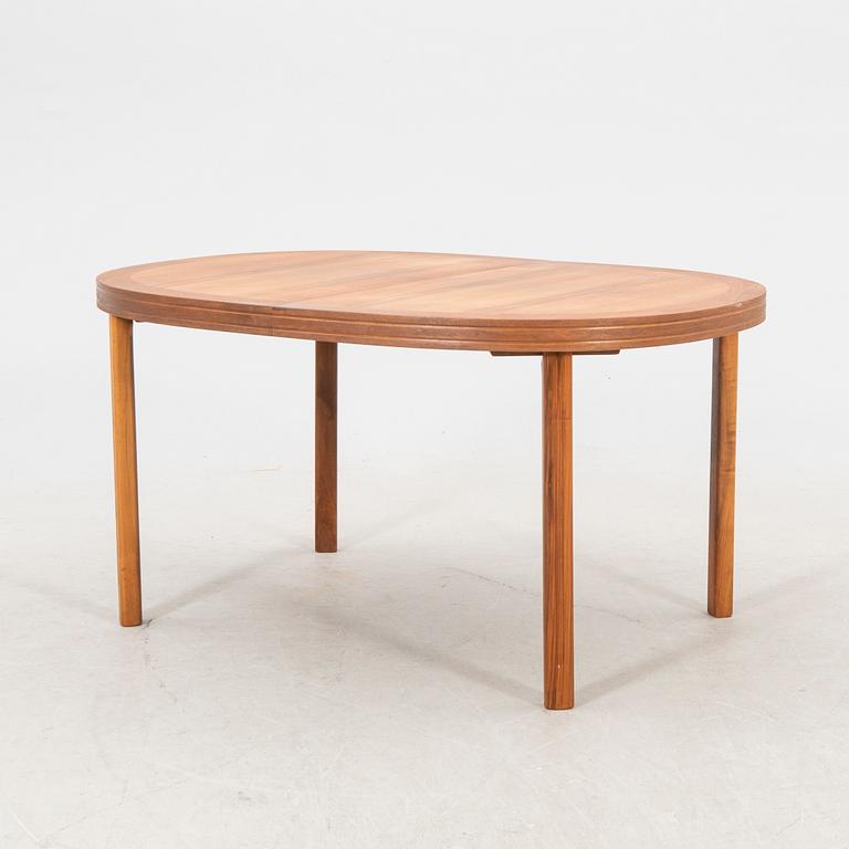 A 1960s walnut Skaraborgs möbelindustri dining table.