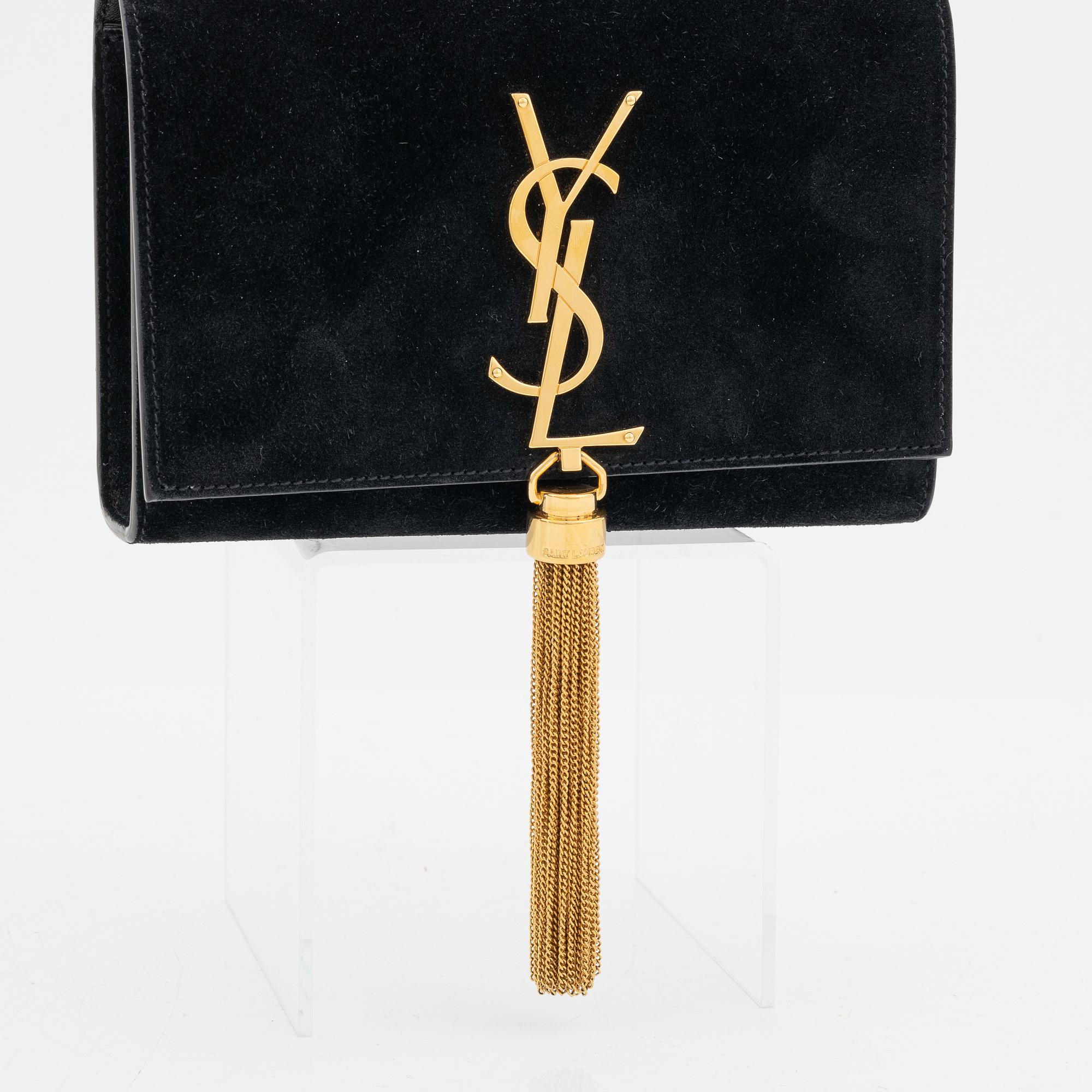 Yves Saint Laurent, a black suede 'Kate Small' handbag.