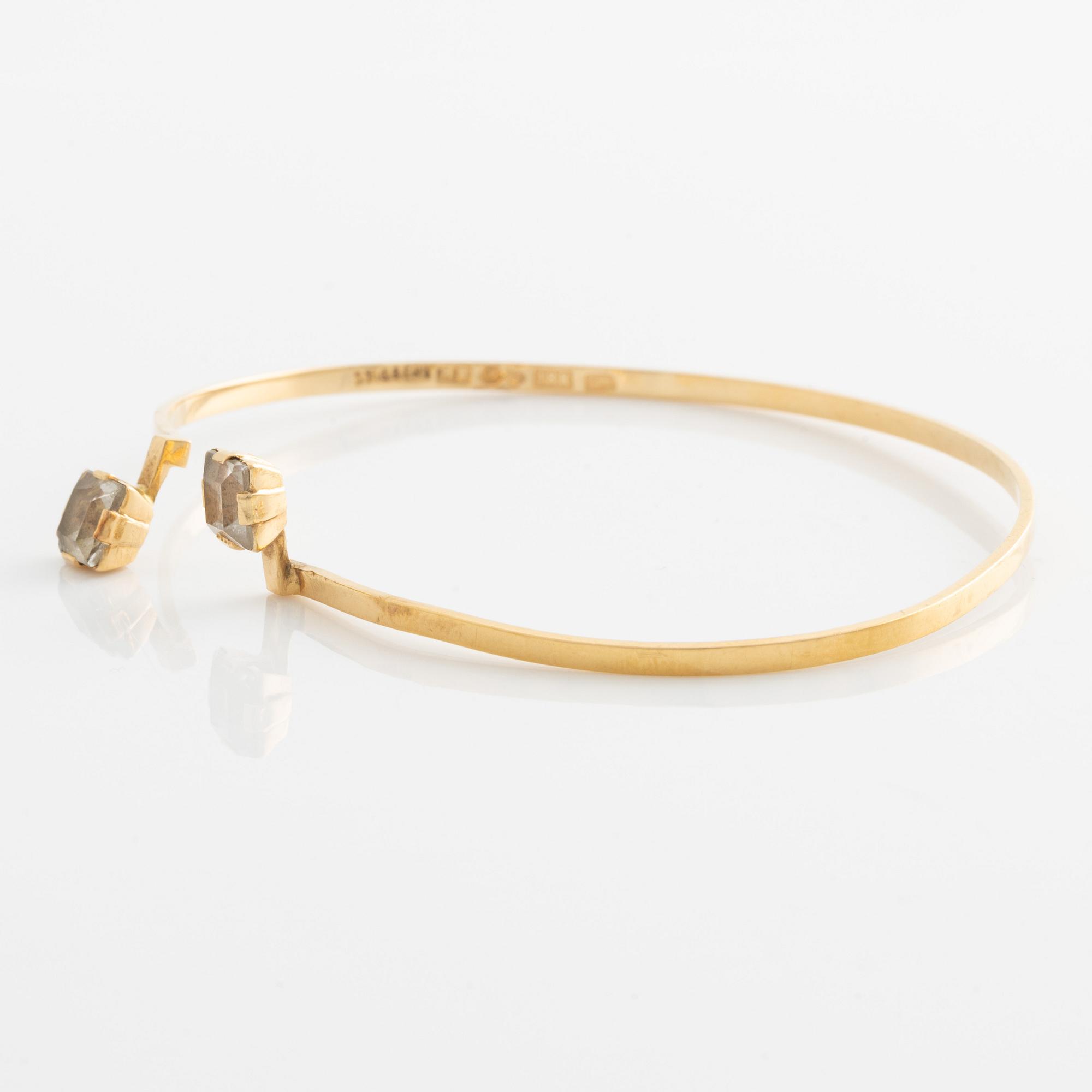 Stigbert, armring, 18K guld med bergkristall.