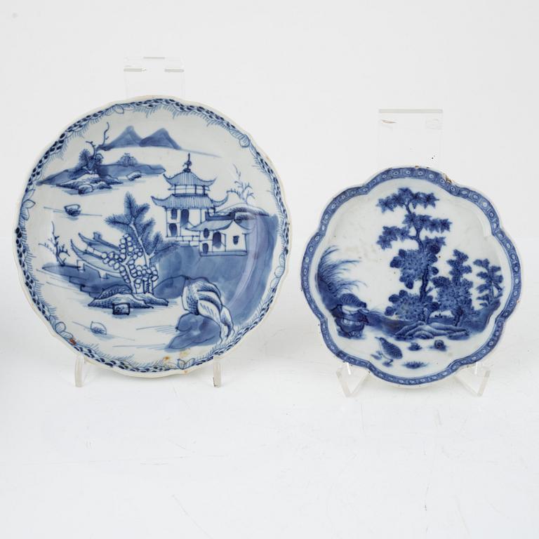 A blue and white stemcup and two dishes, Qing dynasty, 18th Century.