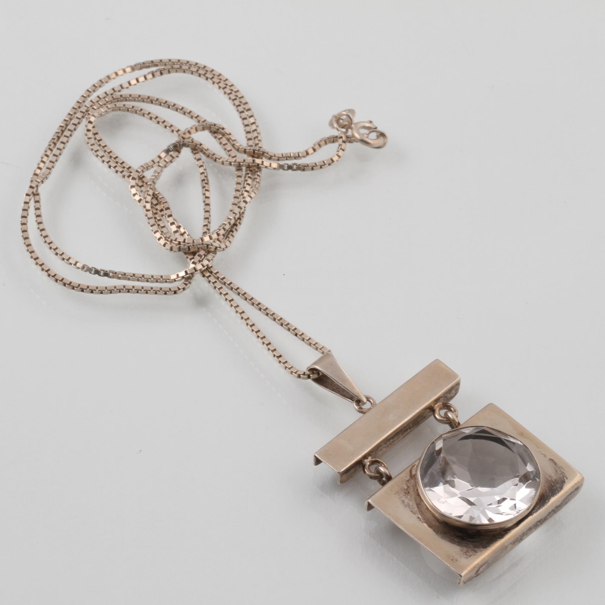 HÄNGE, sterlingsilver med fasettslipad bergkristall, stämplat A/K. Vikt 20,4 gram.