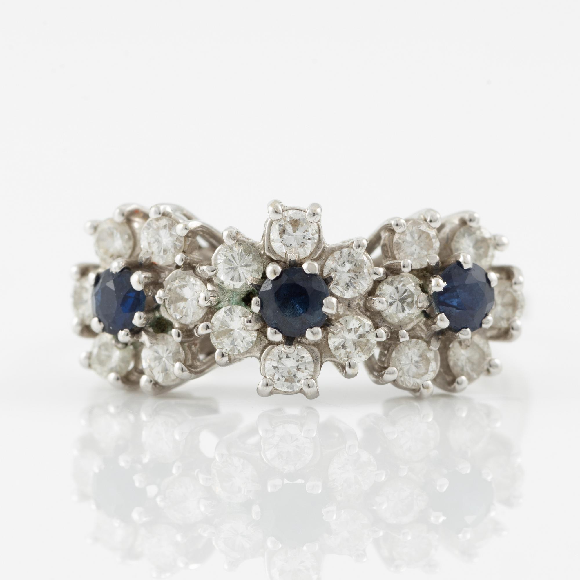 Ring in 18K white gold set with sapphires and brilliant-cut diamonds,.