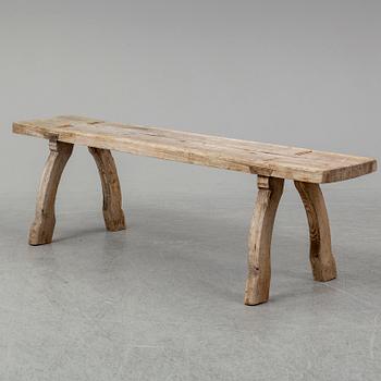 a 19th century pine bench.