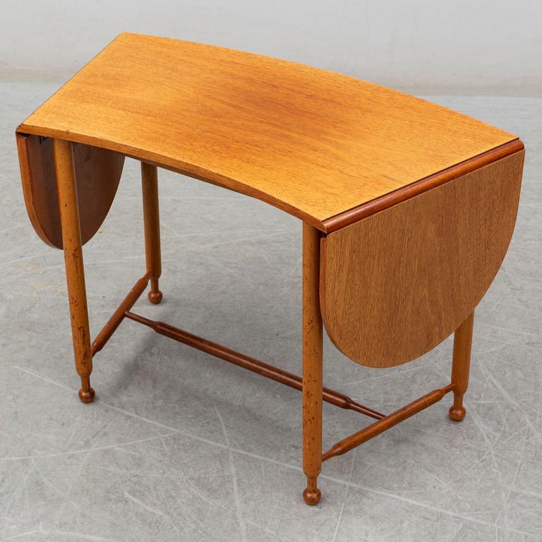 JOSEF FRANK, a model 1333 mahogany table from Firma Svenskt Tenn.
