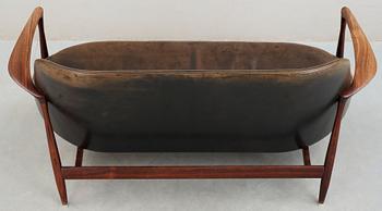 An Ib Kofod Larsen 'Elisabeth' palisander and black leather sofa, Christensen & Larsen, Denmark 1950-60's.