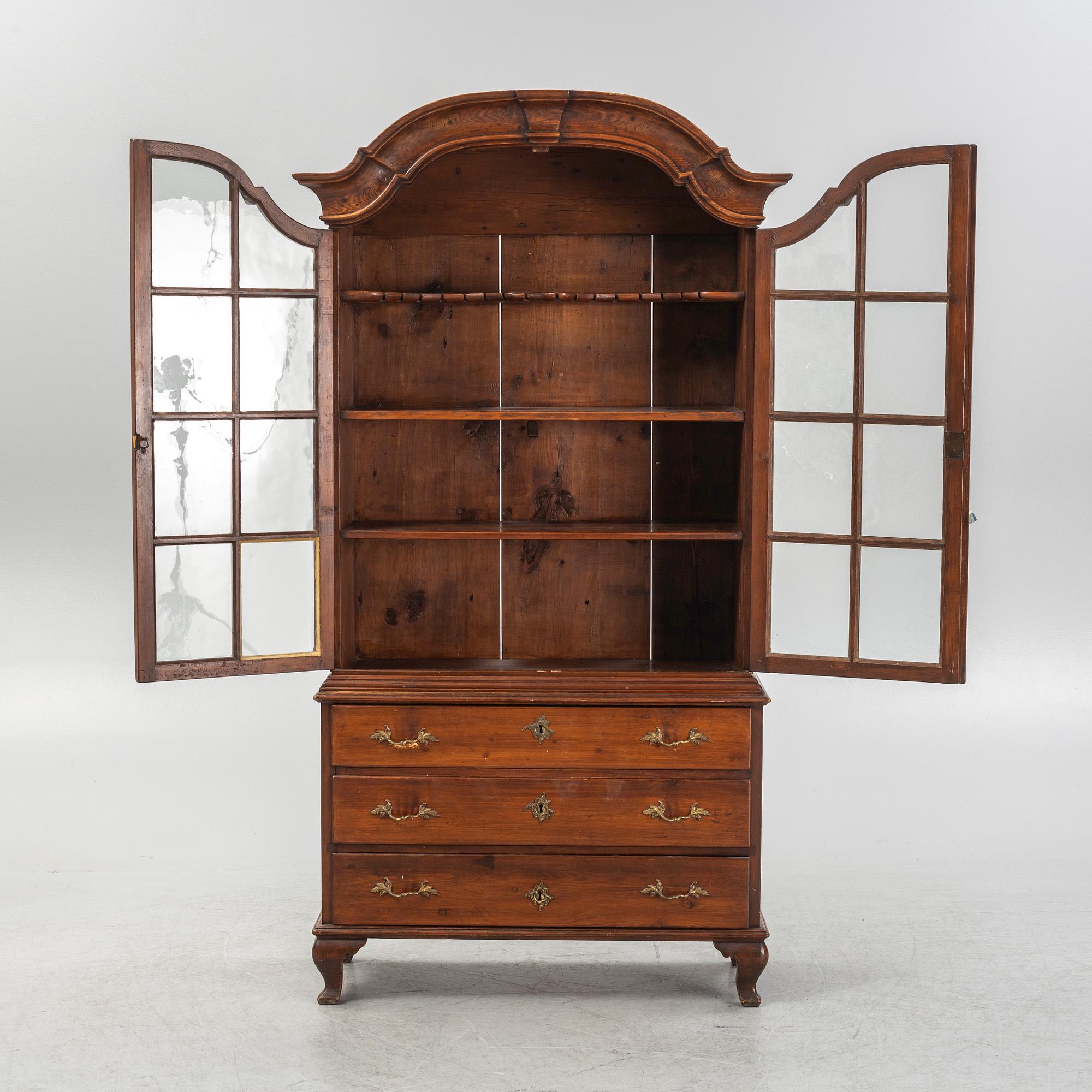 Display cabinet, circa 1900.