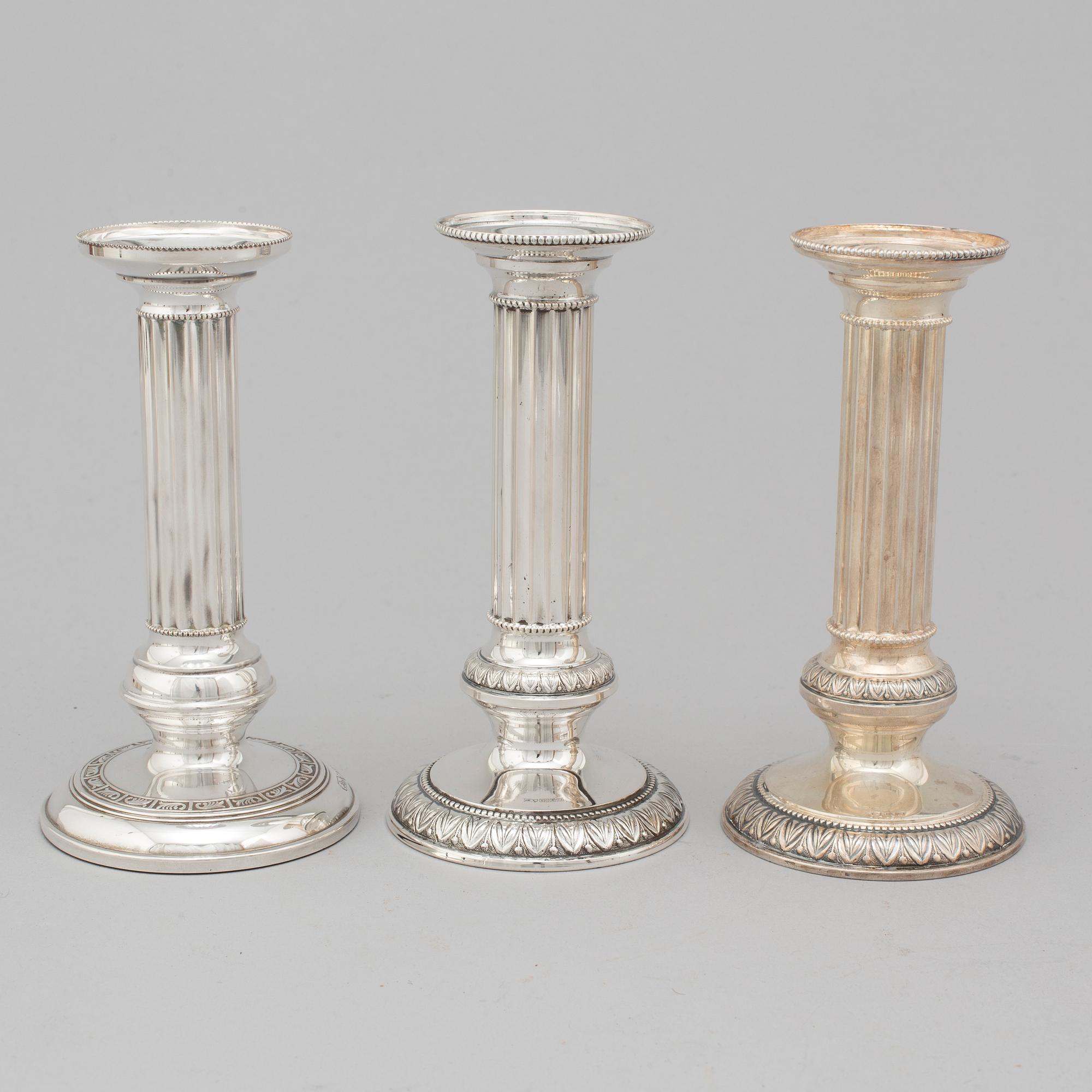 Three Finnish silver candlesticks, 1989-97.