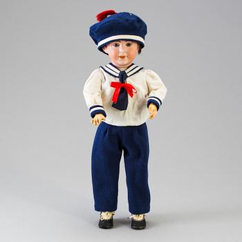 A bisque head boy doll 238 by S.F.B.J, Paris, France, 1910s.