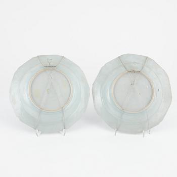 A set of 15 famille rose dinner plates, Qing dynasty, Qianlong and one Canton 19th Century.