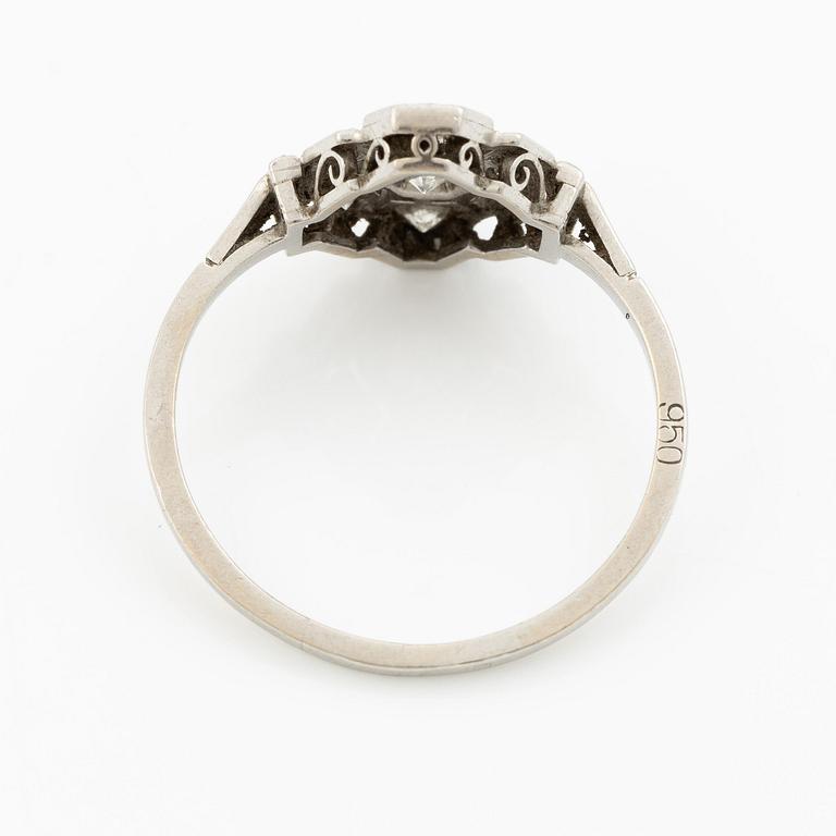 A platinum ring set with round brilliant-cut diamonds and sapphires, Art Déco.