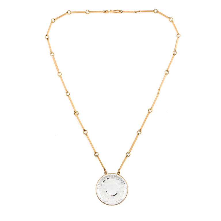 Wiwen Nilsson, an 18K gold necklace with a rock crystal pendant, Lund 1975.