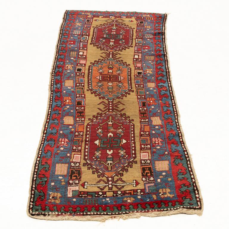 An antique Northwest Persian runner, c. 257 x 99 cm.