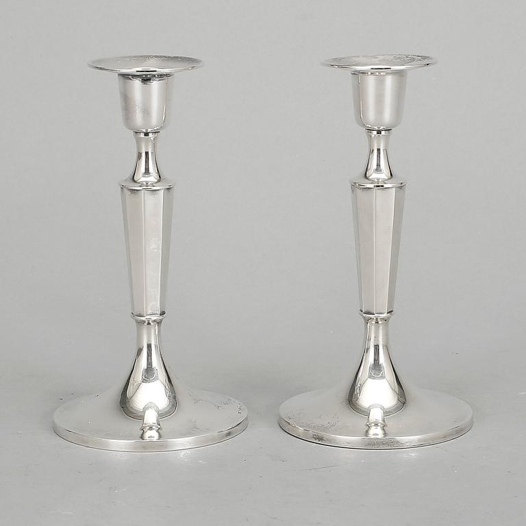 LJUSSTAKAR, ett par, silver, MGAB. Uppsala, 1962.
