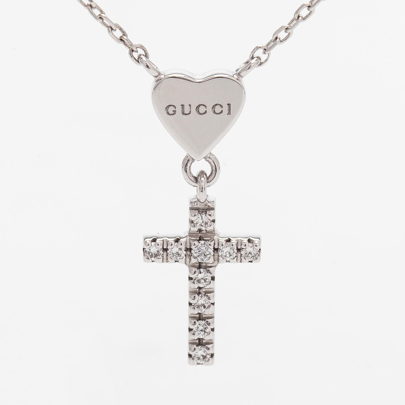 Gucci, an 18K white gold necklace with diamonds.