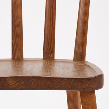 Axel Einar Hjorth, a set of three stained pine "Utö" chairs, Nordiska Kompaniet, Sweden, 1930s.