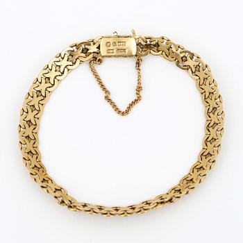 ARMBAND, 18K guld, Thulins Eftr Urhandels, Stockholm, 1936. Vikt ca 13,45 g.