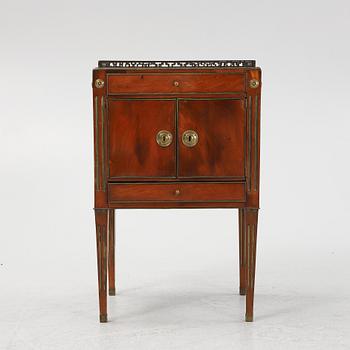 A late Gustavian mahogany-veneered chamberpot cupboard, late 18th century.