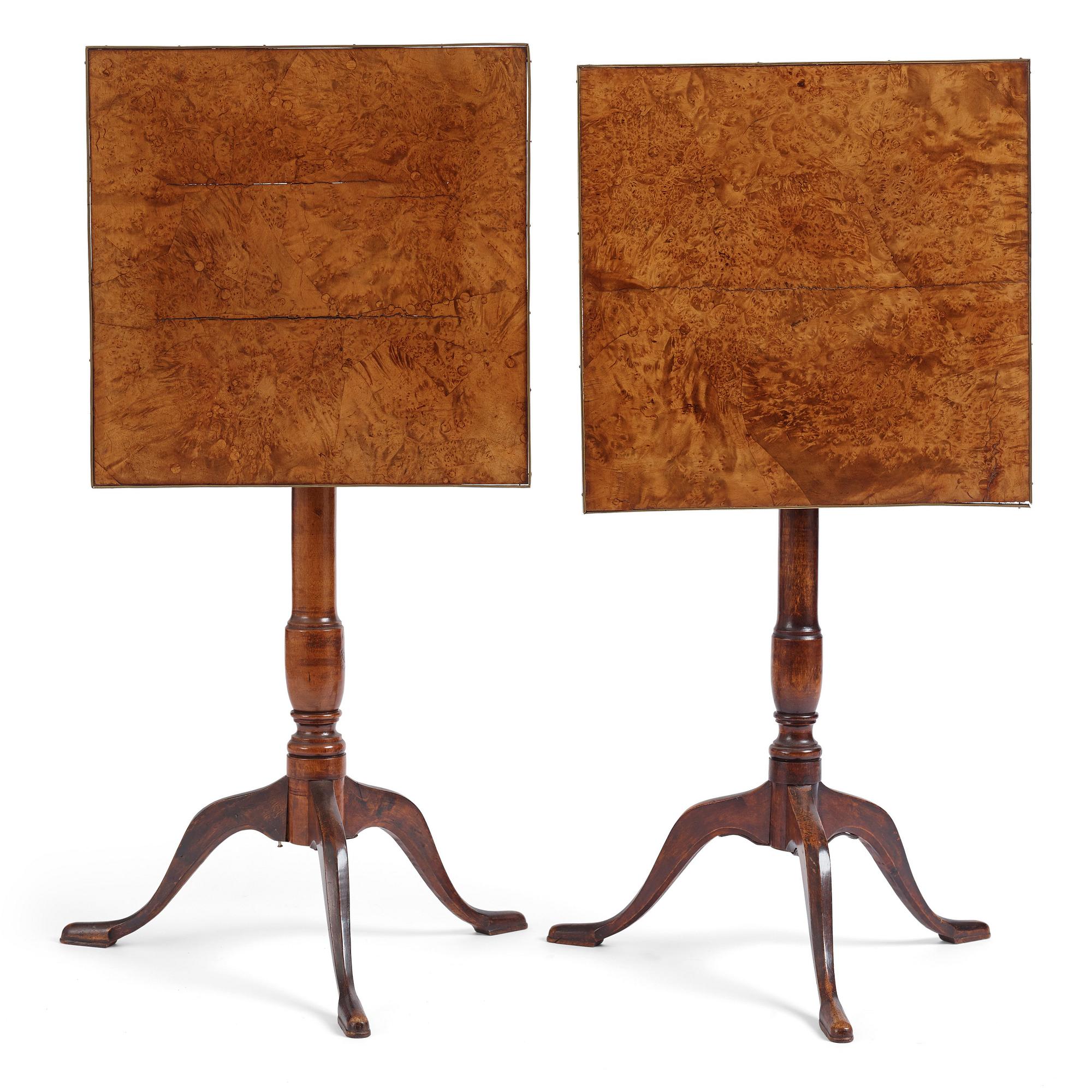 A pair of alder-veneered tilt-top tables by C. Hollst (master 1787-1830).