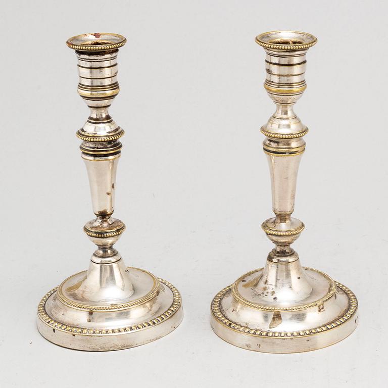 A pair of French  19th century Christofle candlesticks.