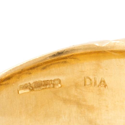 An 18K gold ring set with round brilliant-cut diamonds, London.
