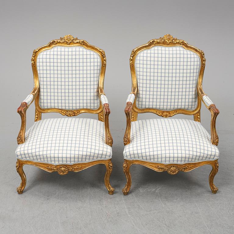 A pair of neo-rococo easy chairs, late 19th century.