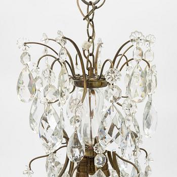 A chandelier, Rococo style, mid-20th century.