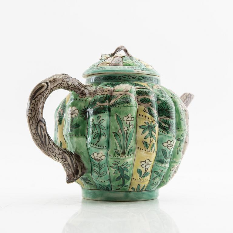 A set of three differently decorated tea pots with covers, Qing dynasty, 18century and 20th century.