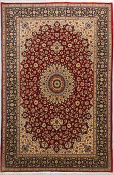 A Carpet from Qum / Ghom. Circa 306x201 cm.