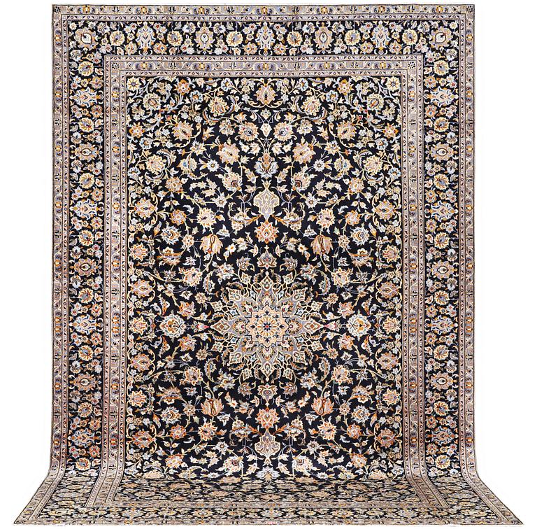 A Kashan carpet, signed, c. 410 x 270 cm.