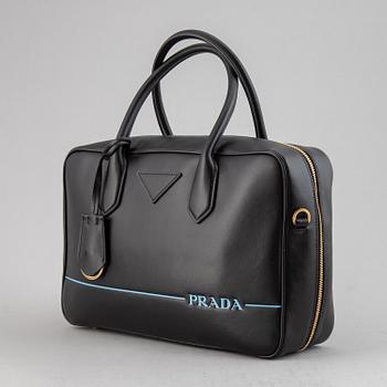 PRADA, a leather bag.