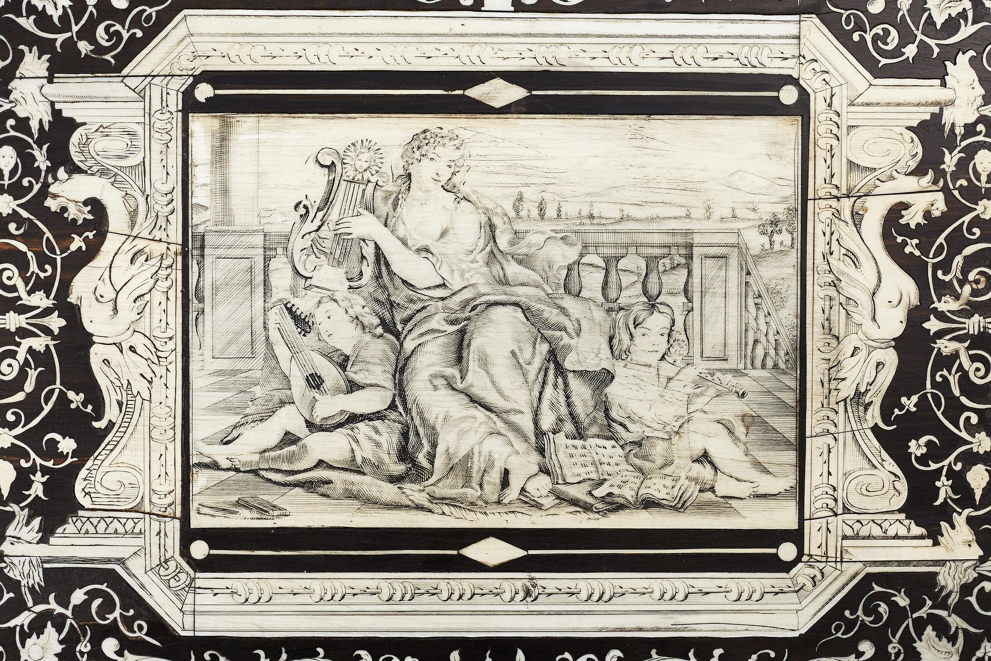 A Renaissance-style ebony, ebonized and ivory-inlaid library table, late 19th century, presumably Germany.