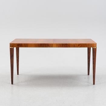 A Swedish Modern mahogany dining table, mid 20th Century.