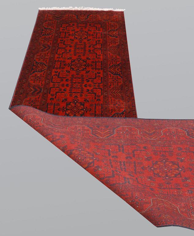 An Afghan runner, so called Khan Mohammadi, ca 297 x 78 cm.