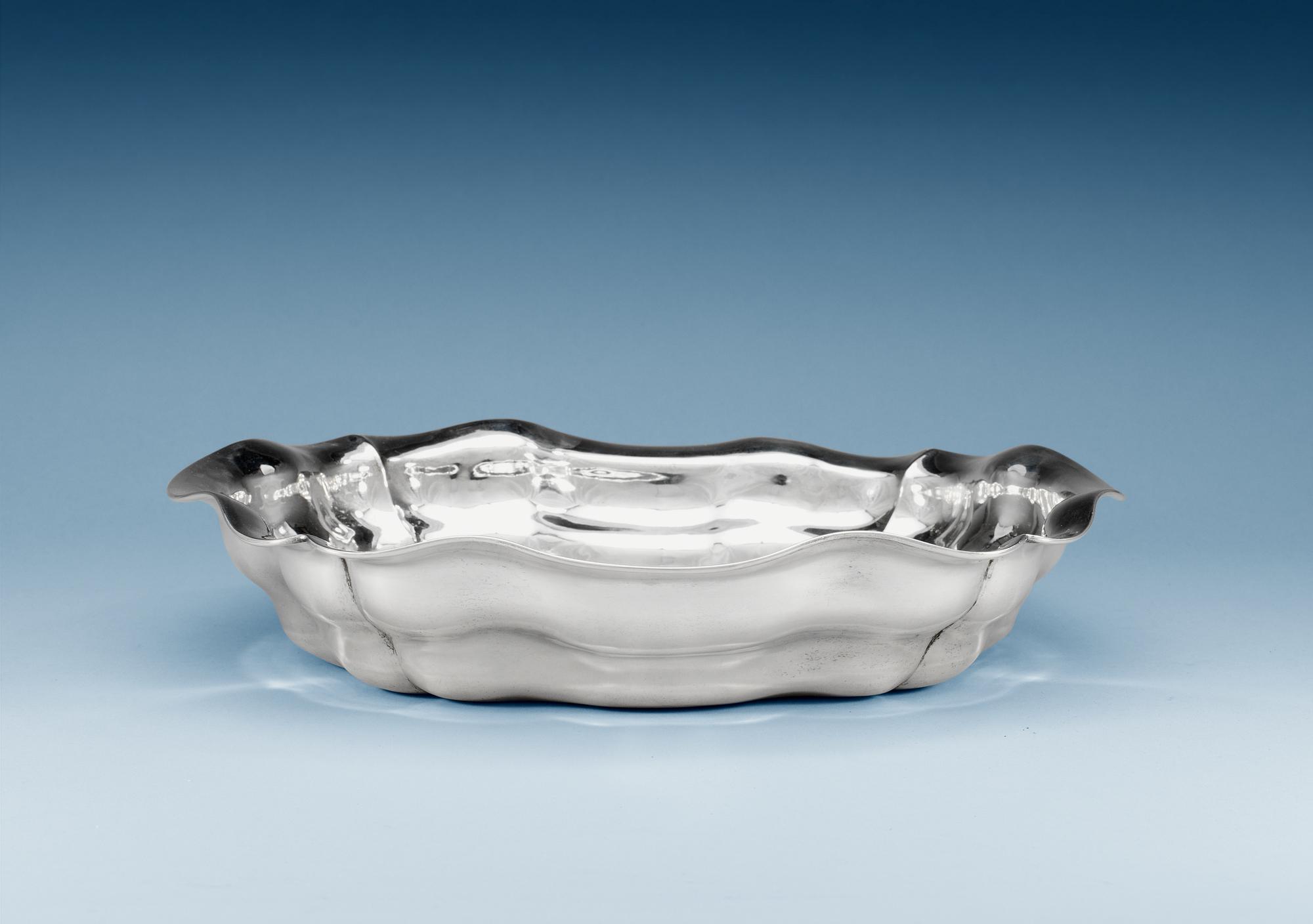 A RUSSIAN SILVER BASIN, makers mark of Joseph Nordberg, St. Petersburg 1856.