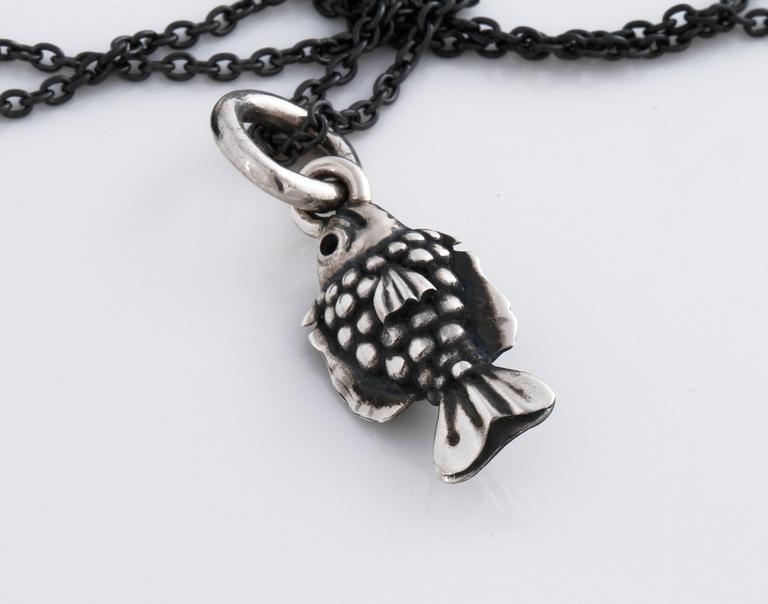 A pendant, "My friend" by Ole Lynggaard.