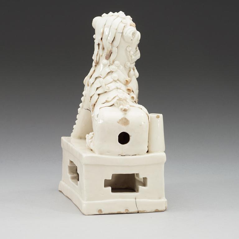 A blanc de chine censer, in the shape of a sitting Buddhist lion, Transition, 17th Century.