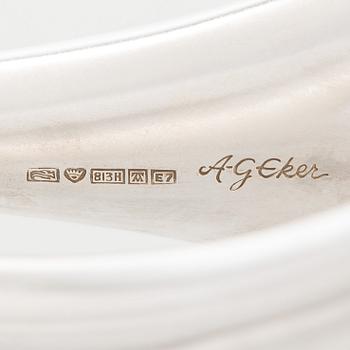 Anna-Greta Eker, Kynttilänjalkoja, 3 kpl, hopeaa, Auran Kultaseppä oy, Turku 1958 ja 1961.