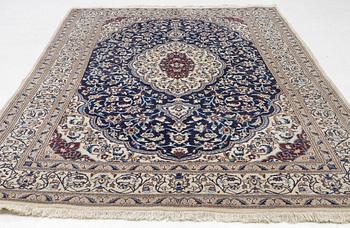 A Nain carpet, c. 295 x 190 cm.