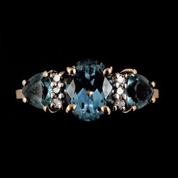 RING, 14k guld med 3 fasettslipade turmaliner samt 6 briljantslipade diamanter. Vikt 3 g.