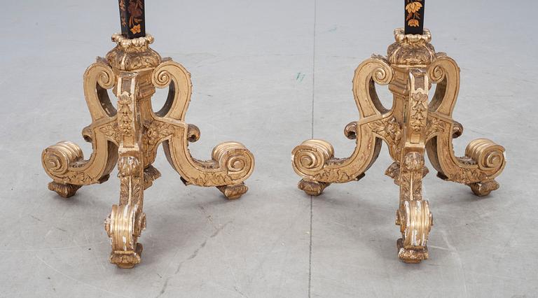 A pair of French Baroque circa 1700 candle stands.