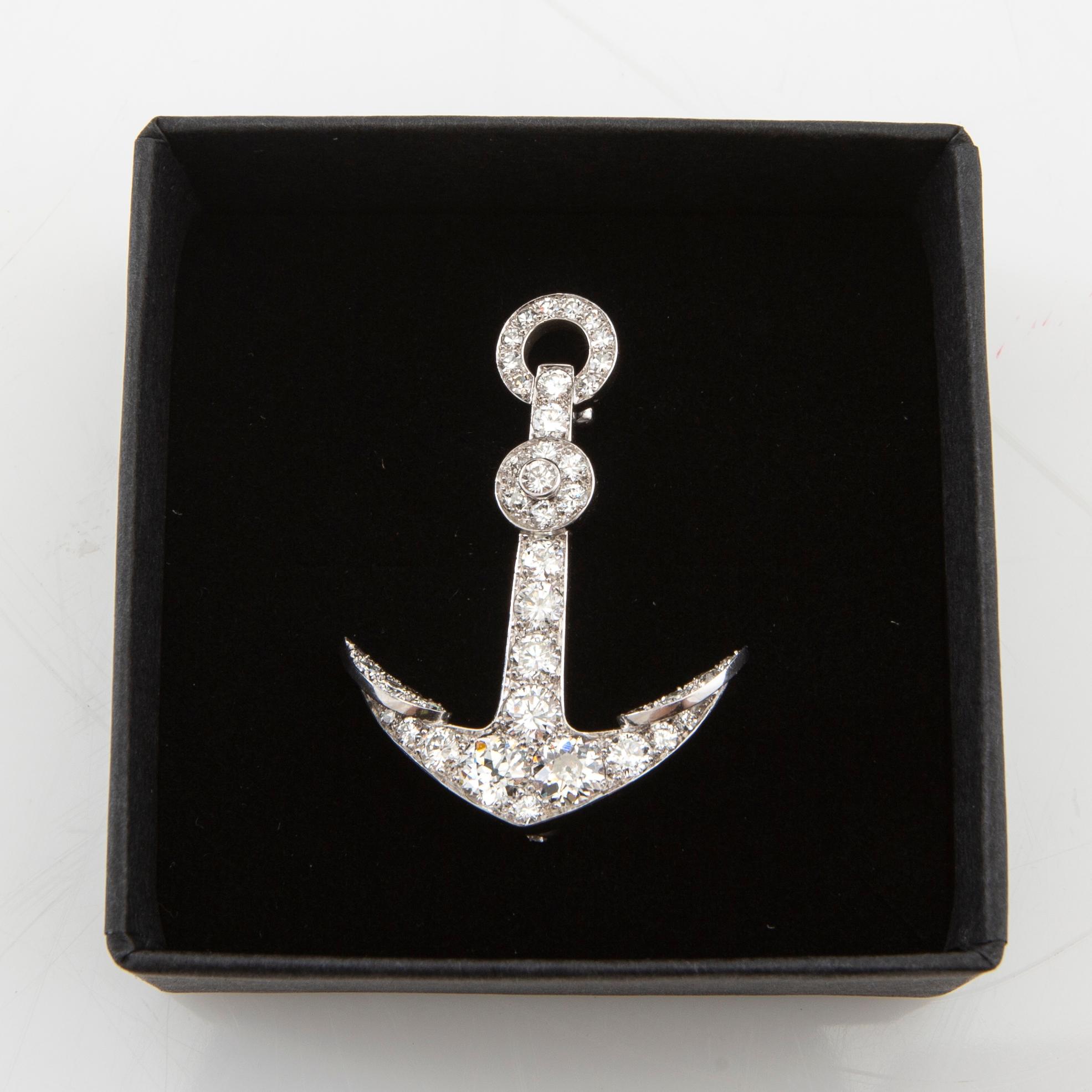 Brooch in the form of an anchor made of 18K white gold with diamonds.