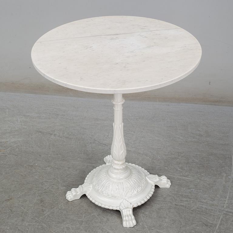 A cast iron and marble café table from Byarum.