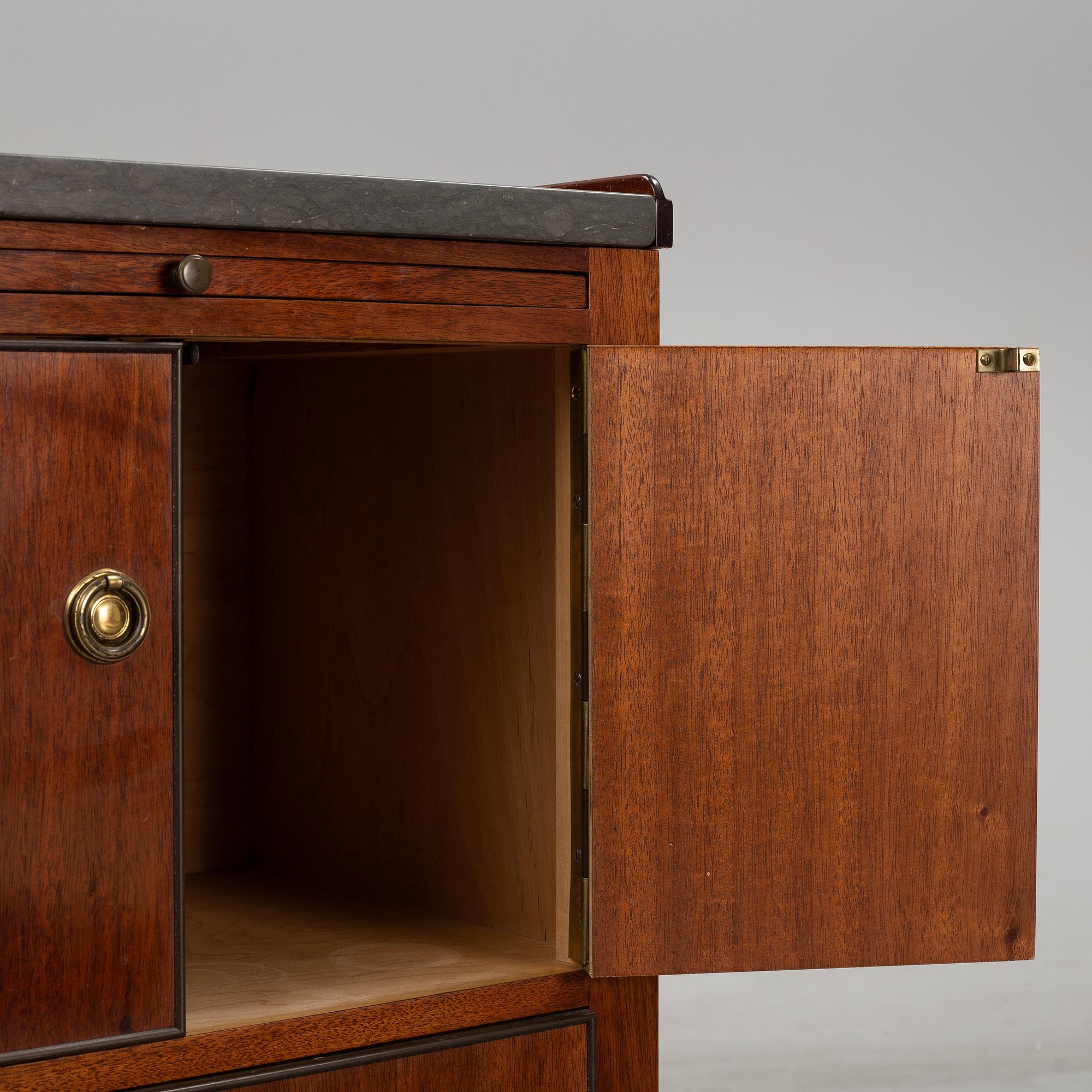 A pair of mahgany veneered bedside cabinets, early 20th Century.