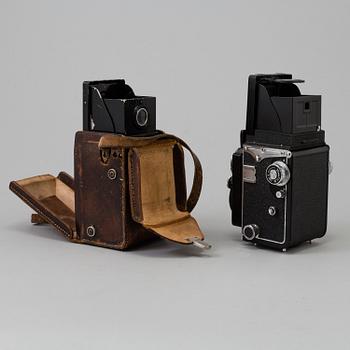 Two Twin Lens Reflex Cameras, a 1950s /60s Yashica 635 and a 1930s Rolleicord.